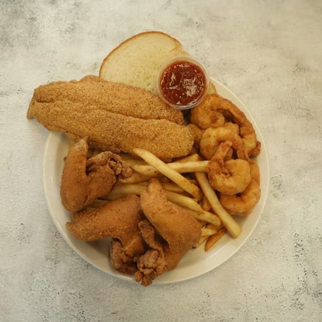 5. 1 Piece Fish, 3 Wings & 10 Shrimp with Fries & Bread.