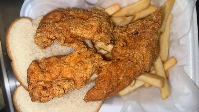 4 Pieces Chicken Tenders with Fries & Bread.